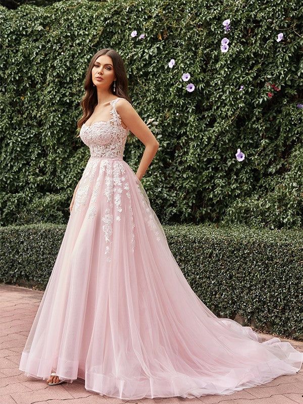 Long Flowing Sleeveless Evening Gown with a Train